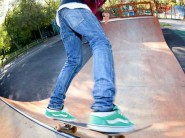 Skateboarder to jump the railing
